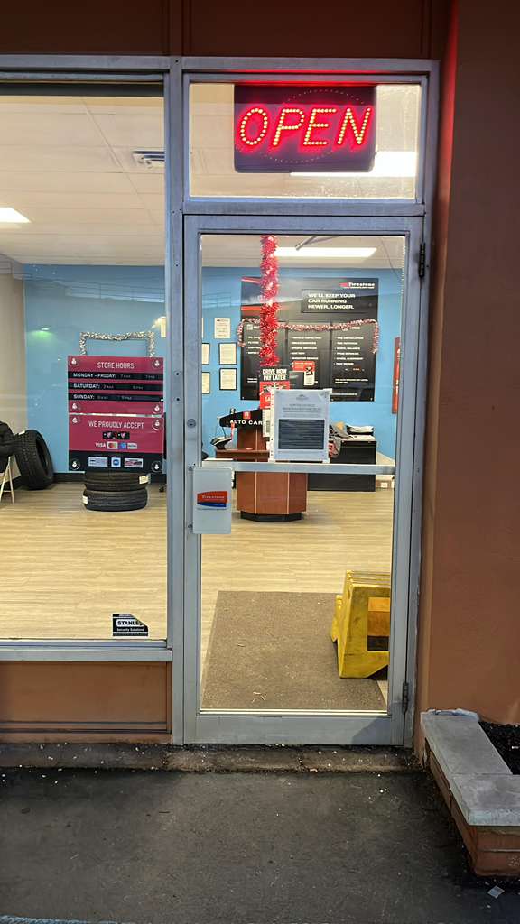 Storefront entry glass Baltimore retail.